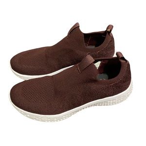 Red slip on sneakers